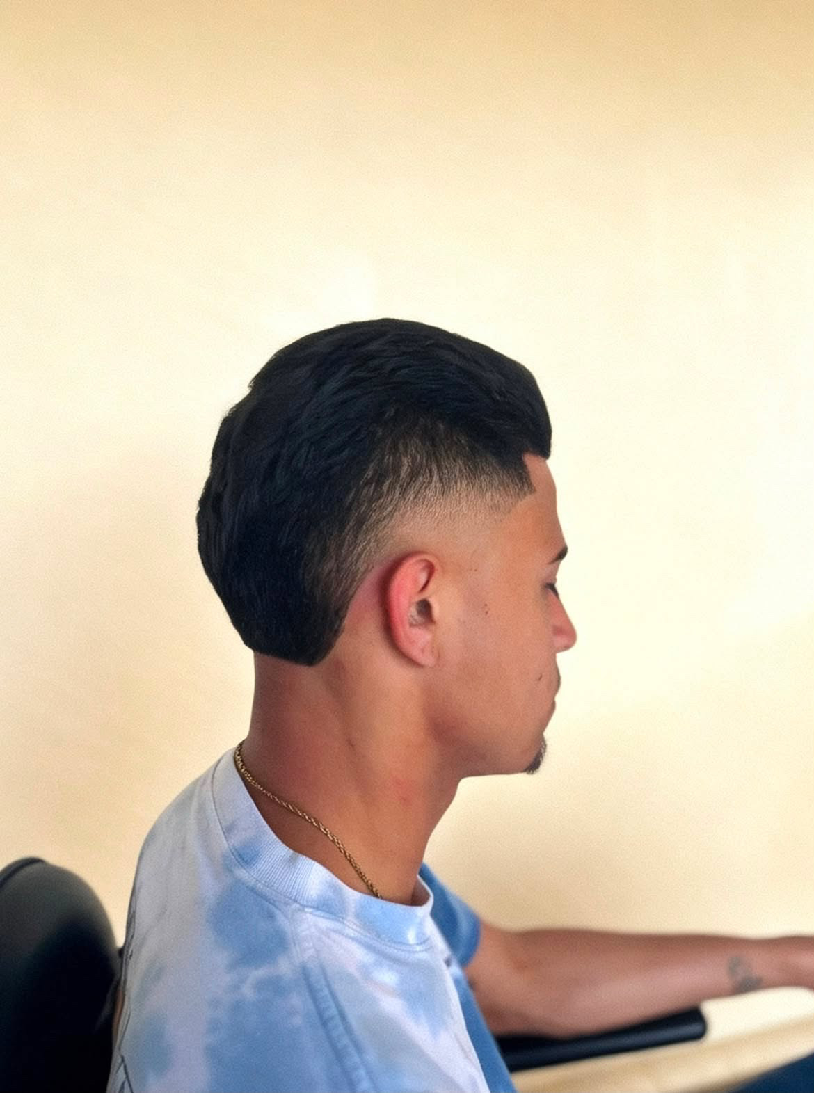 Low taper fade with textured top